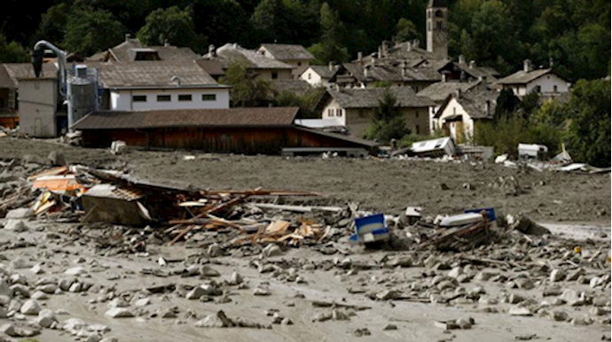 More landslides expected in Swiss valley, search for hikers halted
