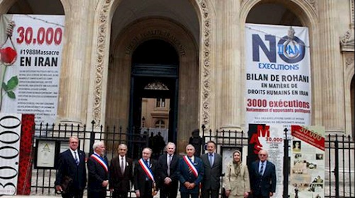  'exhibition of 1988 massacred political prisoners in Paris'