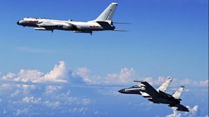 China says nothing will stop its long-range air force drills