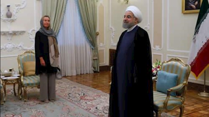  'EU foreign policy chief Federica Mogherini greets Iranian regime President Hassan Rouhani. Tehran, 5 August'