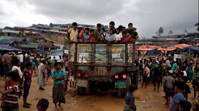  'Rohingya refugee children gather on a truck in Coxs Bazar, Bangladesh, September 28, 2017'