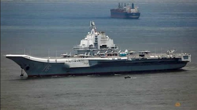 Amid tension, China carrier group sails through Taiwan Strait