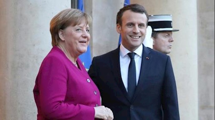 Macron boosts Merkel ahead of key coalition vote