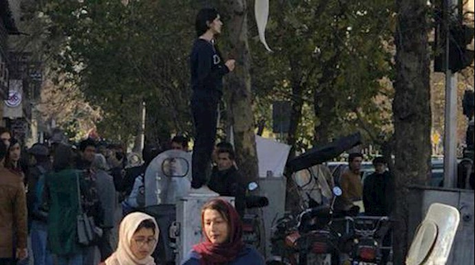  'This young woman who defied the Mullahs dress code was arrested'