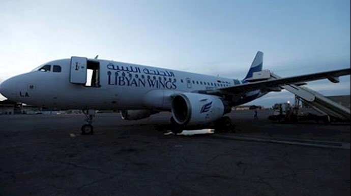 At least 20 dead as clashes shut airport in Libyan capital