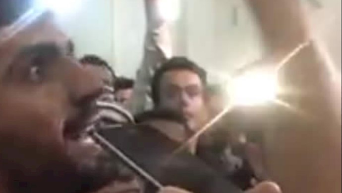  'A snapshot taken from a video clip showing protesters chanting' They would continue their strike and protests''