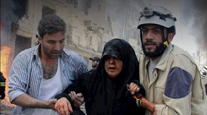  'File Photo, aid workers rescuing a wounded woman in a bombing city of Douma'