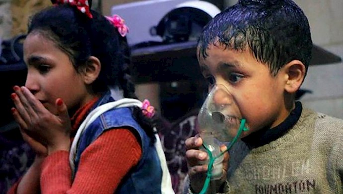  'A child receives oxygen through a respirator following an alleged poison gas attack in the rebel'