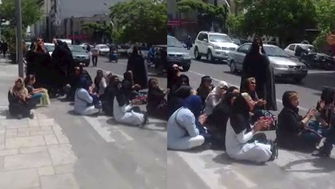  'Women protesters blocked the street in front of the Afzal-e Toos'