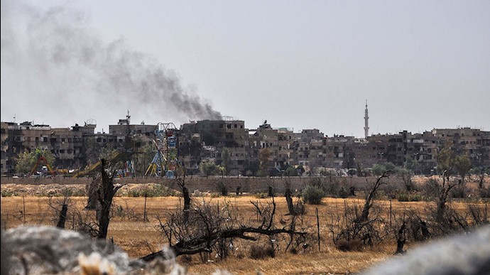  'A plume of smoke rising in Douma, Syria on Friday'
