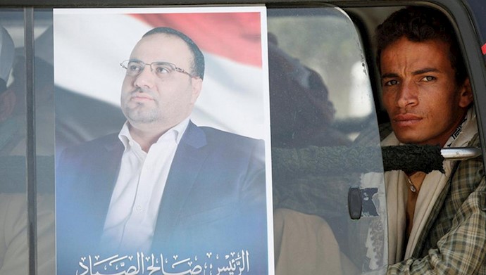  'A poster is seen in Sanaa of Saleh al-Sammad, who headed the Houthi-led Supreme Political Council'