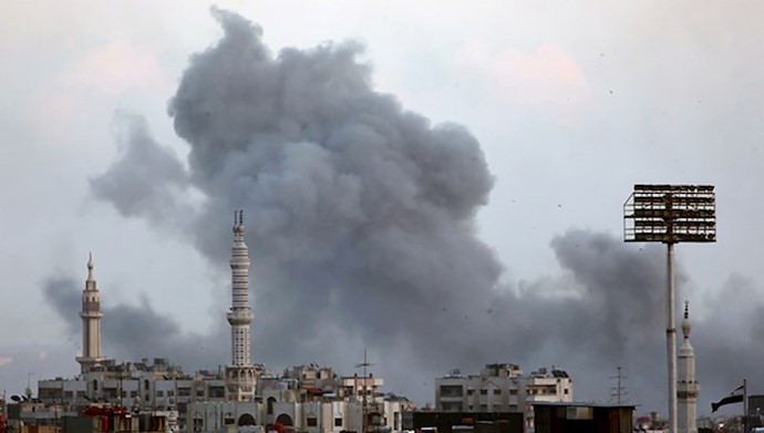  'Smoke rises from Yarmouk Palestinian camp in Damascus'