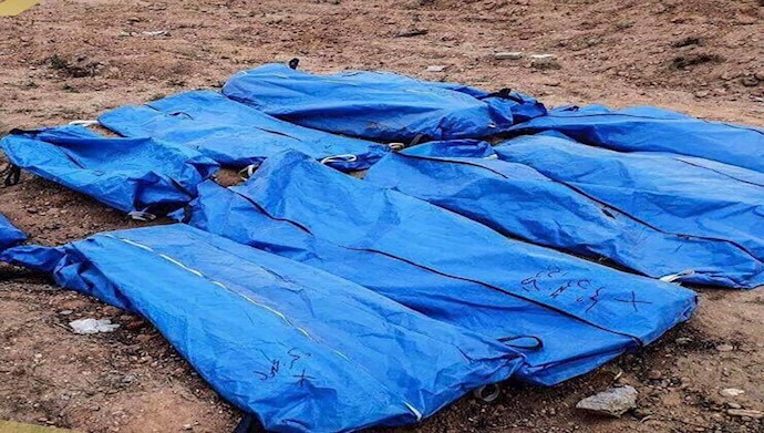  'A mass grave containing approximately 500 unidentified bodies was found at alRashid Stadium in Raqqa city'