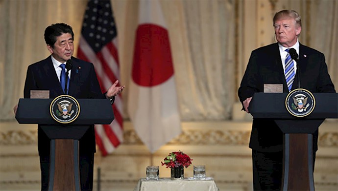  'Japanese Prime Minister Shinzo Abe, left, speaks as President Donald Trump listens during a news conference at Trump's private Mar-a-Lago club, on April 18, 2018, in Palm Beach, Fla'
