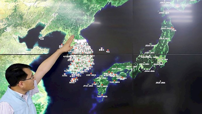  'File photo, Earthquake, and Volcano of the Korea Monitoring Division Director Ryoo Yong-Gyu speaks to the media about North Korea’s artificial earthquake with a map of the Korean peninsula in Seoul, South Korea.'
