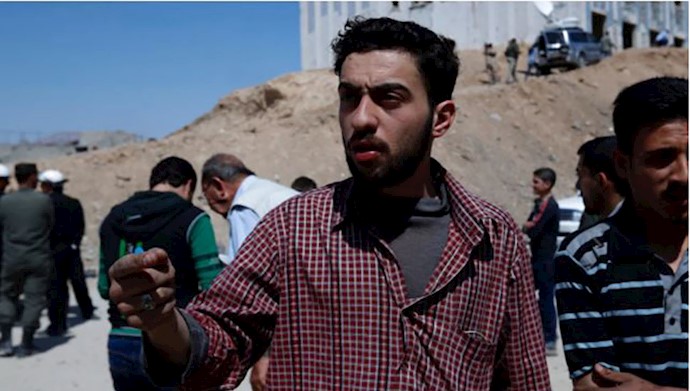  'A man who lost his wife and daughters during chemical weapons attack speaks during an interview with AP'