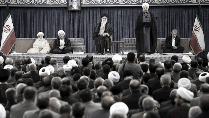 'Hassan Rouhani, second from right, and Supreme Leader Ali Khamenei, center'
