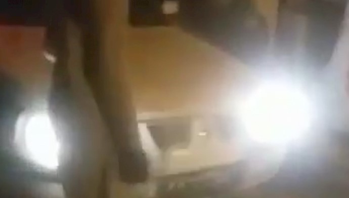  'Screen grab; agents of the repressive mullahs' regime shot a youth dead for carrying rice '